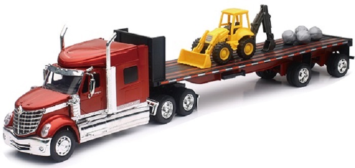 Camion 1/32ème INTERNATIONAL LONESTAR remorque plate avec tracteur et rochers